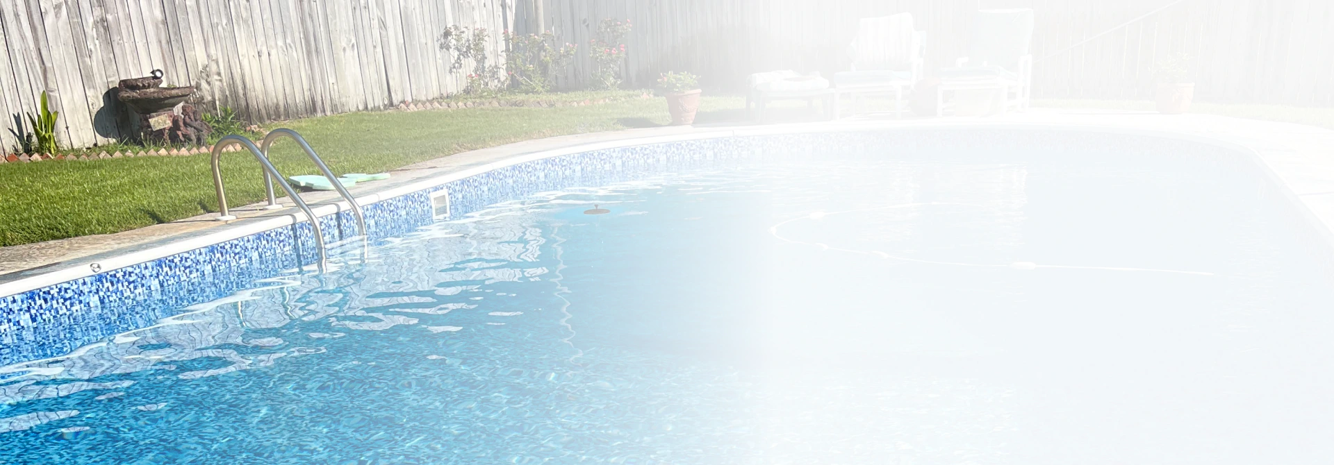 in ground pool in backyard